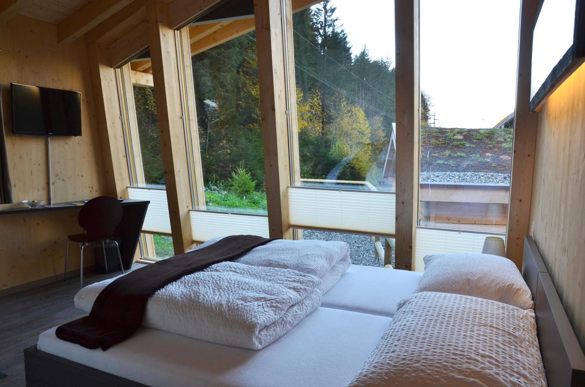Hüttenhotel Husky Lodge Muotathal Værelse billede