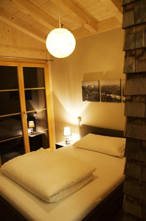 Hüttenhotel Husky Lodge Muotathal Værelse billede