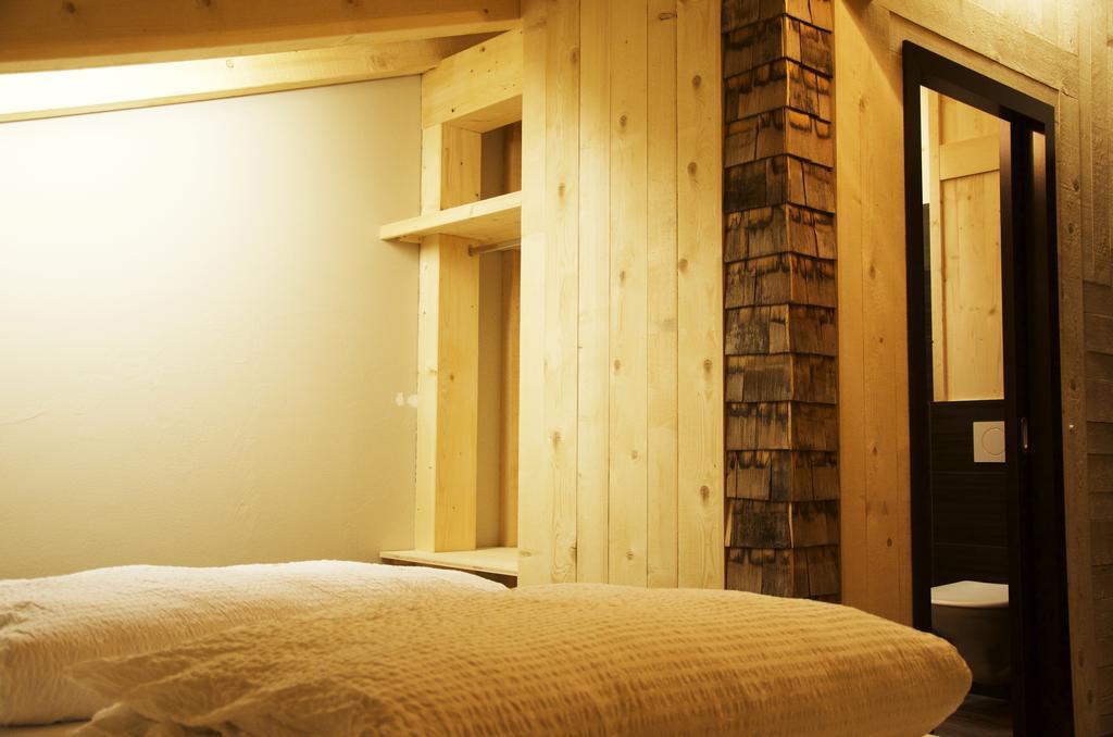 Hüttenhotel Husky Lodge Muotathal Værelse billede